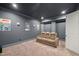 Comfortable home theater room with theater seating, and wall decor at 325 Forest Bridge Rd, Youngsville, NC 27596