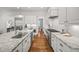 Spacious kitchen with granite countertops, stainless steel appliances, and custom cabinetry at 325 Forest Bridge Rd, Youngsville, NC 27596