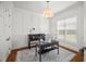 Stylish home office featuring hardwood floors, wainscoting and ample natural light at 325 Forest Bridge Rd, Youngsville, NC 27596