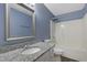 Stylish bathroom featuring a granite countertop, modern sink, and shower-tub combination at 3613 Ranbir Dr, Durham, NC 27713