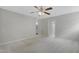 Bright bedroom with neutral walls, plush carpet, and a view of the en-suite bathroom at 3613 Ranbir Dr, Durham, NC 27713