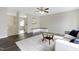 Open-concept living room with hardwood floors, neutral walls, and modern decor at 3613 Ranbir Dr, Durham, NC 27713