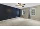 Spacious bedroom with large windows and neutral walls, creating a serene atmosphere at 3613 Ranbir Dr, Durham, NC 27713
