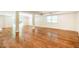 This spacious basement area has a hardwood floor at 3804 Nottaway Rd, Durham, NC 27707