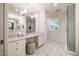 The bathroom has a shower, tile floor, and vanity at 3804 Nottaway Rd, Durham, NC 27707