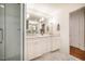 This bathroom has a double vanity and shower with glass enclosure at 3804 Nottaway Rd, Durham, NC 27707