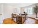 Charming home office with hardwood floors, a window, and comfortable seating at 3804 Nottaway Rd, Durham, NC 27707