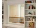 Built-in shelves with a view to another room, offering storage and architectural interest at 3804 Nottaway Rd, Durham, NC 27707