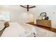 This main bedroom has a ceiling fan, carpet, and ensuite bath and closet at 3804 Nottaway Rd, Durham, NC 27707