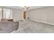 Bright bedroom featuring carpet floors, neutral colored walls, and ample space at 3909 Inland Ct, Raleigh, NC 27606