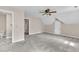 Bright bedroom featuring neutral paint and carpet, with a ceiling fan and an attached bathroom at 3909 Inland Ct, Raleigh, NC 27606