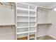 Walk-in closet offering custom built-in shelving for optimal organization at 3909 Inland Ct, Raleigh, NC 27606