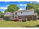 Well-maintained two story home with a brick and vinyl exterior and a large yard at 3909 Inland Ct, Raleigh, NC 27606