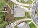 Aerial view of a home showing the driveway, walkway and surrounding yards at 408 Jerome Rd, Durham, NC 27713