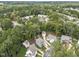 Picturesque aerial view of homes surrounded by lush greenery in a tranquil neighborhood setting at 408 Jerome Rd, Durham, NC 27713