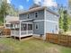 Exterior of home with a screened porch and well-maintained lawn at 408 Jerome Rd, Durham, NC 27713