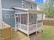 Exterior view of a home featuring a screened-in porch and a deck at 408 Jerome Rd, Durham, NC 27713