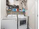 A practical laundry room with modern LG washer and dryer, plus wire shelving for storage at 408 Jerome Rd, Durham, NC 27713