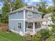 Beautiful two-story home featuring a side porch and manicured lawn at 408 Jerome Rd, Durham, NC 27713