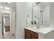 Bathroom featuring a single vanity with granite counters, tiled floors, and neutral walls at 419 Travertine Dr, Cary, NC 27519