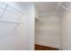 Spacious walk-in closet offers ample storage with multiple levels of wire shelving at 419 Travertine Dr, Cary, NC 27519