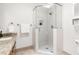 Bathroom featuring granite countertops, glass shower, and white subway tile at 4704 Lancashire Dr, Raleigh, NC 27613