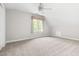 Spacious bedroom with neutral carpet and vaulted ceilings offers plenty of natural light at 4704 Lancashire Dr, Raleigh, NC 27613