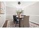 Inviting dining room with hardwood floors and decorative lighting at 4704 Lancashire Dr, Raleigh, NC 27613