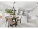 Bright breakfast nook and kitchen area with a round table and stainless steel appliances at 4704 Lancashire Dr, Raleigh, NC 27613