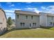 Home with manicured backyard featuring a concrete patio and a blue sky at 4727 Smarty Jones Dr, Knightdale, NC 27545