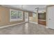 Open-concept kitchen offers lots of natural light from large windows and has an adjacent living room at 4727 Smarty Jones Dr, Knightdale, NC 27545