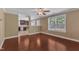 View from the living room into the kitchen featuring hardwood floors and natural light at 4727 Smarty Jones Dr, Knightdale, NC 27545