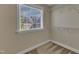 Walk-in closet featuring shelving and natural light from the window at 4727 Smarty Jones Dr, Knightdale, NC 27545