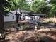 Backyard area with garden and white gazebo at 5002 Wickham Rd, Raleigh, NC 27606