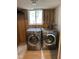 Laundry room with efficient LG washer and dryer at 5002 Wickham Rd, Raleigh, NC 27606