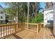 Spacious wooden back deck, great for enjoying the outdoors, with natural wooded backdrop at 5049 Lundy Dr # 102, Raleigh, NC 27606