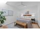 Stylish bedroom features a skylight, woven bench, area rug, and neutral decor at 511 S Bloodworth St # 102, Raleigh, NC 27601