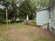 Spacious backyard area featuring ample greenery, outdoor seating, and peaceful surroundings for relaxation at 514 E Lee St, Smithfield, NC 27577