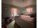 Cozy bedroom featuring a comfortable bed, soft lighting, and serene atmosphere for restful nights at 514 E Lee St, Smithfield, NC 27577
