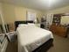 Inviting bedroom featuring a comfortable bed, classic wooden dresser, and relaxing ambiance at 514 E Lee St, Smithfield, NC 27577