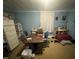 Home office area featuring a large desk, ample storage, and practical design for productivity at 514 E Lee St, Smithfield, NC 27577