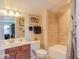 Bathroom featuring a tile shower, modern vanity, and a toilet with fixtures at 5144 Niagra Dr, Chapel Hill, NC 27517