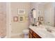 Well-lit bathroom with a single vanity, framed art, and neutral decor at 5144 Niagra Dr, Chapel Hill, NC 27517