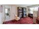 Bonus room with built-in bookcases, desk, chair, and a cozy reading nook at 5144 Niagra Dr, Chapel Hill, NC 27517