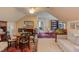 Versatile bonus room with dining area, desk, and a comfortable seating area at 5144 Niagra Dr, Chapel Hill, NC 27517