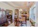 Bright dining room with hardwood floors, a large window, and decorative furnishings at 5144 Niagra Dr, Chapel Hill, NC 27517