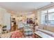 Open-concept living room with a view of the kitchen, hardwood floors, and stylish decor at 5144 Niagra Dr, Chapel Hill, NC 27517