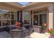 Charming outdoor patio area with seating, potted plants, and natural light at 5144 Niagra Dr, Chapel Hill, NC 27517