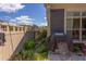 Backyard patio space featuring lush greenery and a built-in grill and serene backyard views at 5144 Niagra Dr, Chapel Hill, NC 27517