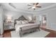 Beautiful main bedroom with a tray ceiling and a decorative headboard at 525 Morning Oaks Dr, Holly Springs, NC 27540